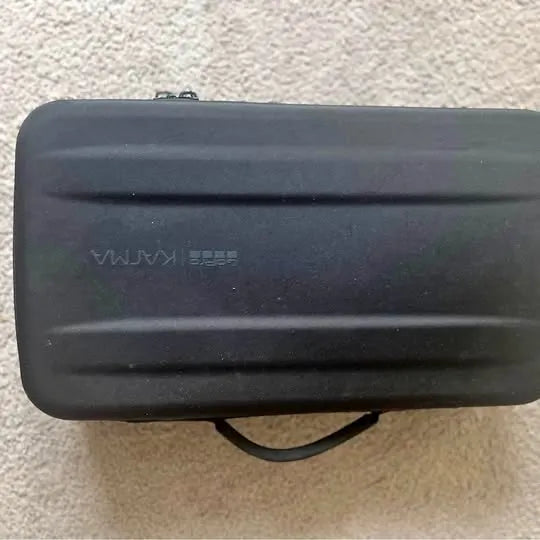 Black hard-shell drone case with latch and molded handle