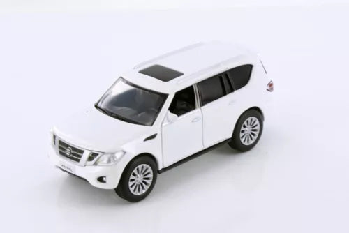 White Nissan Patrol Y62 diecast model SUV toy car, front three-quarter view.