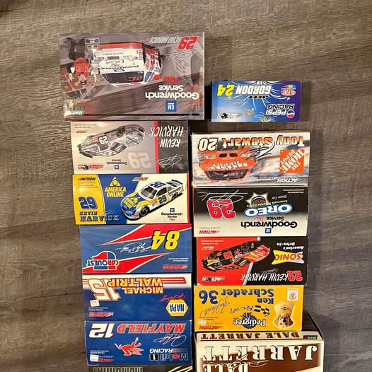 NASCAR diecast car in retail box, with race car graphics and number 62