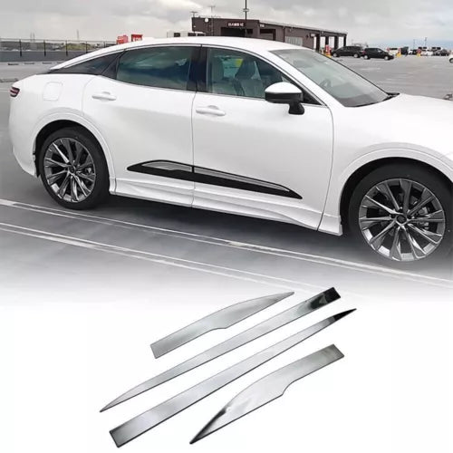 White diecast sedan model with chrome side trim pieces, 1/43 scale