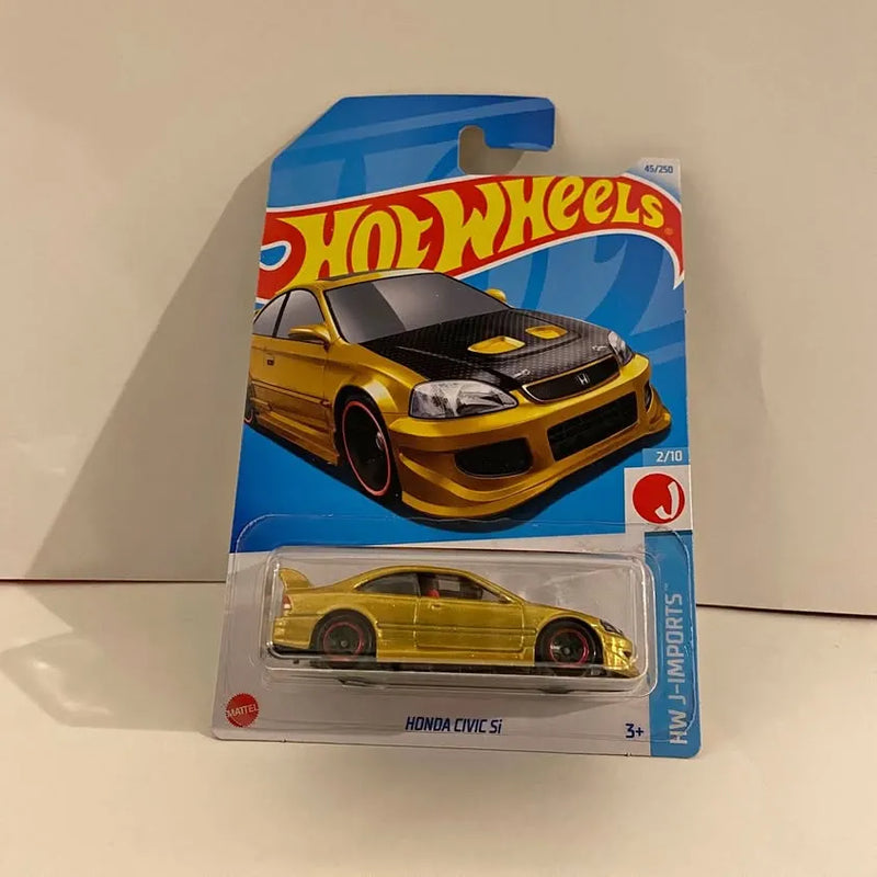 Gold Honda Civic Si Hot Wheels diecast car in clear blister pack