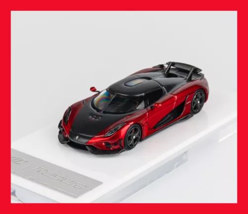 Metallic red and black diecast model car, front 3/4 view on display base