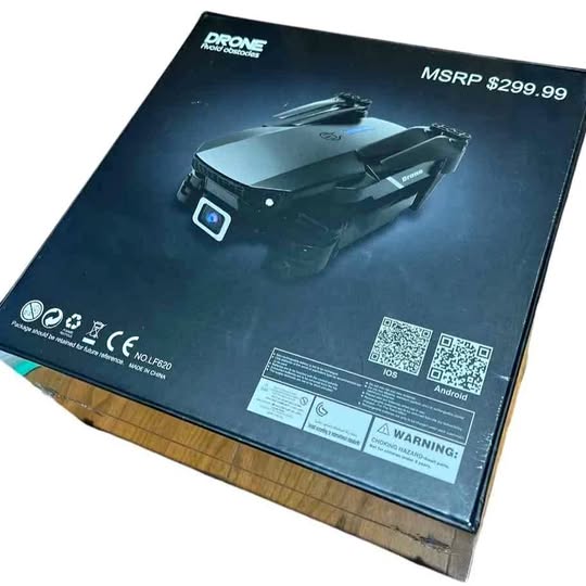 Drone remote control box with printed drone image and QR codes