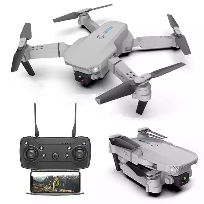 Foldable quadcopter kids drone with dual cameras and remote controller with screen