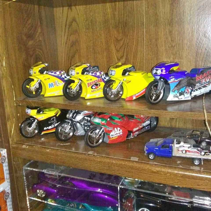 Diecast motorcycle set with four sport bikes in yellow, purple, red, and black
