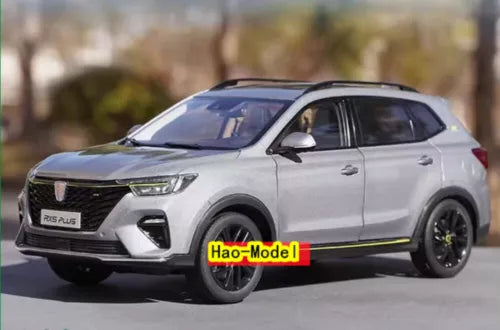 Roewe RX5 PLUS diecast model car, silver SUV with black wheels, front three-quarter view