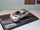 Silver diecast scale model sports car on branded display base