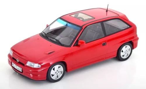 Red diecast coupe model car, front-left view, silver wheels