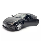 Diecast sports toy car, dark gray with open door, pull-back style wheels