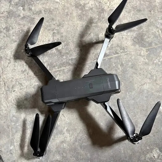 Babylon NY drone quadcopter with four propellers, dark gray body