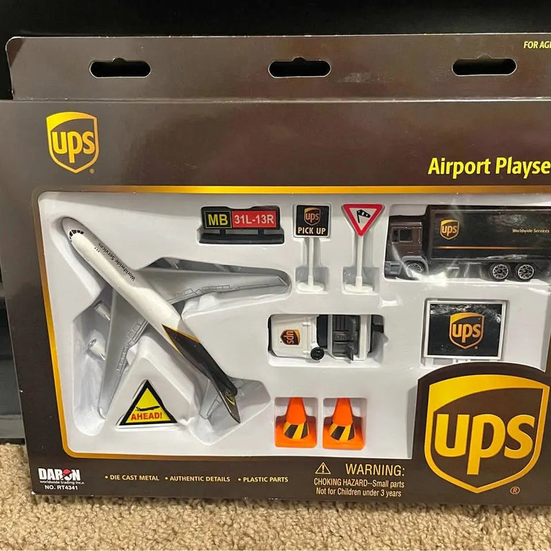 UPS diecast car set in retail box with visible model vehicle and UPS logos