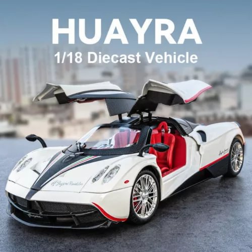 White 1:18 diecast sports car model with red interior and open top