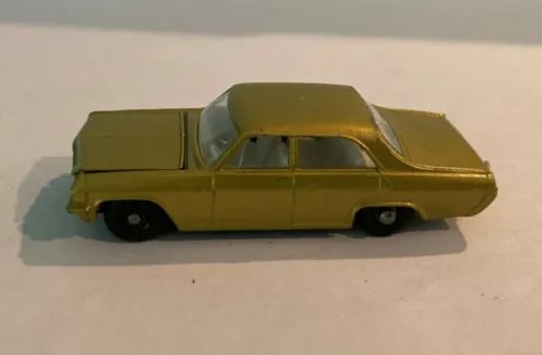 Olive green diecast toy sedan car with roof and side windows, black wheels