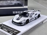 1:64 white sports diecast model car with black front splitter and black wheels