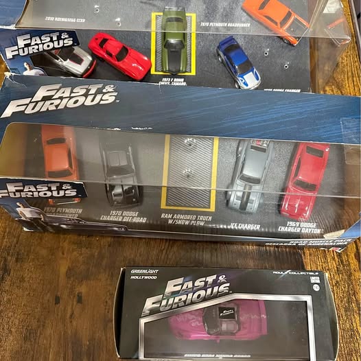 Fast & Furious diecast car set in box with multiple car models and logos