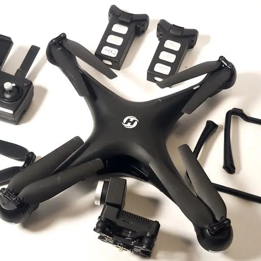 Holy Stone HS110D FPV quadcopter drone, black with four propellers and camera gimbal