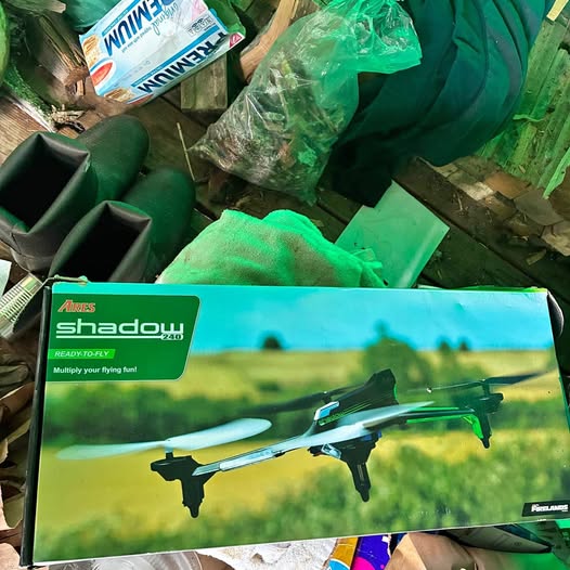 Drone retail box with Shadow drone graphic and green landscape