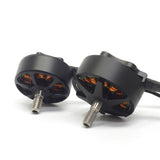 Brushless drone motors with alloy shafts and orange stator windings, black housings