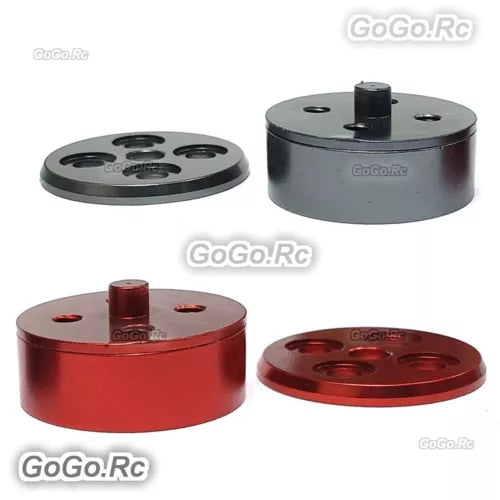Quick release drone base mount with center post, circular plate, and screw holes, metal