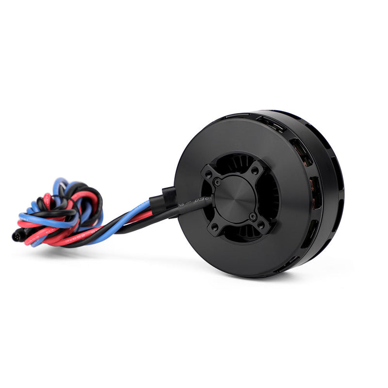 Drone motor accessory with black housing, prop shaft, and multicolor wiring