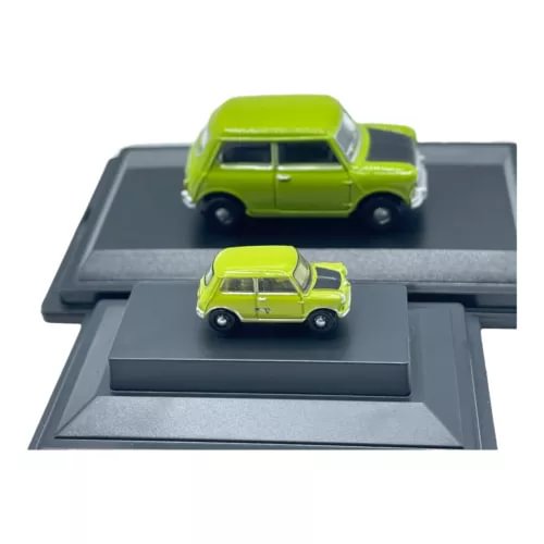 Green mini diecast cars pair on gray display stands, front and rear angles