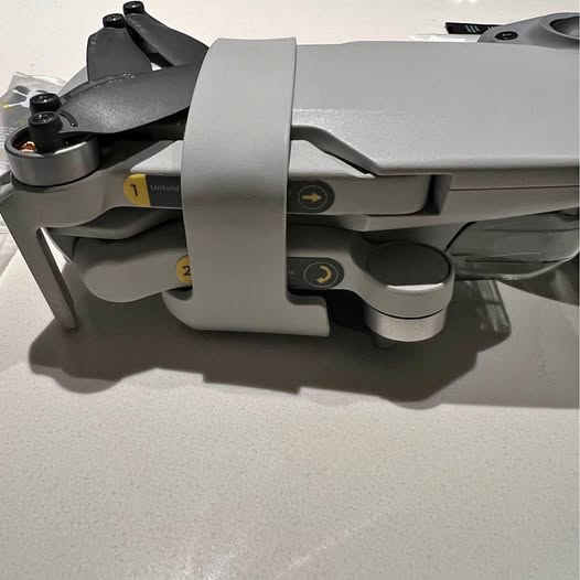 DJI Mini 2 drone with folding landing gear and rear side view