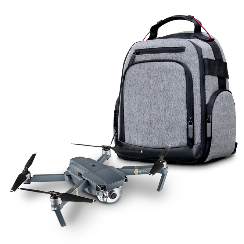 Gray and black drone backpack with front pocket and carrying handle, with quadcopter beside it