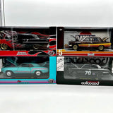 1:24 diecast car set in boxes, black/red and yellow/black Datsun styles