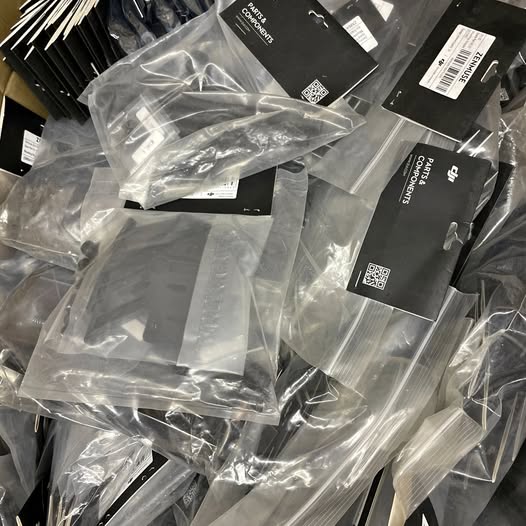 Assorted electronic components in clear plastic bags, labeled