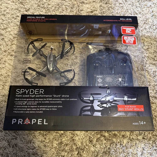Stunt drone box with Propel SPYDER palm-sized drone and remote controller