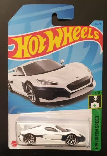 White diecast car in Hot Wheels blister, green speed series card
