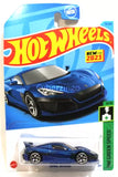 Blue sport diecast model car in Hot Wheels blister pack, 1/64 scale