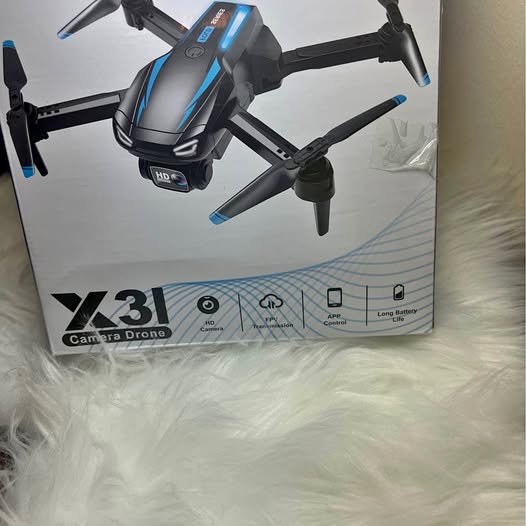 Camera drone with four propellers, blue accents