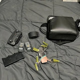 DJI Spark drone accessories: black case, controller, and propellers