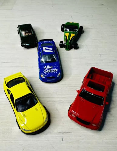 Diecast race car set, five cars: blue, yellow, red, green, and black.
