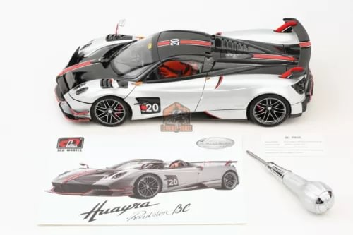 1:18 scale Pagani Huayra BC roadster diecast car, silver with black and red details.
