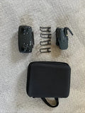 Drone charging kit with black hard case, charger, and cables