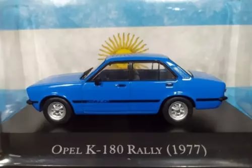 Blue 1:43 diecast rally car with black trim, side view, silver wheels