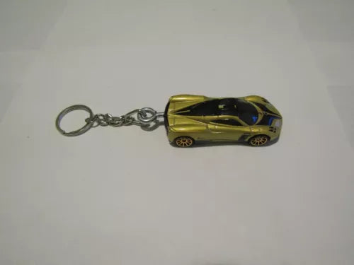 Gold and black race car diecast keychain with metal chain and key ring