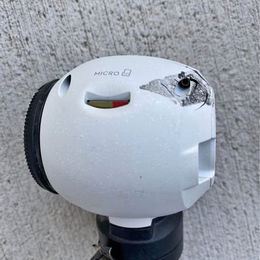 White drone camera gimbal with lens opening and MICRO label