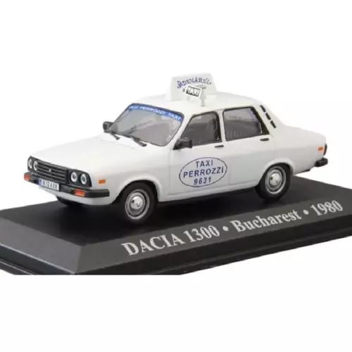 White Dacia 1300 taxi diecast model car, front grille and side taxi signage visible