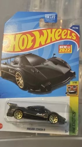 Hot Wheels Pagani Zonda R diecast car, black with gold wheels, in blister pack