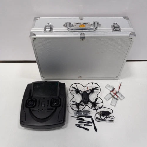 Mini quadcopter drone kit with controller, propellers, and carrying case