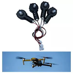 RC drone motor components set: four black motors with wiring harness and plugs