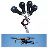 RC drone motor components set: four black motors with wiring harness and plugs