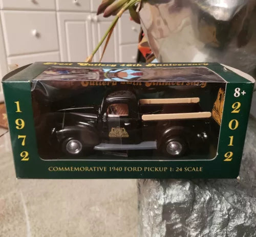 Green 1940 Ford commemorative pickup truck diecast in display box, 1:24 scale