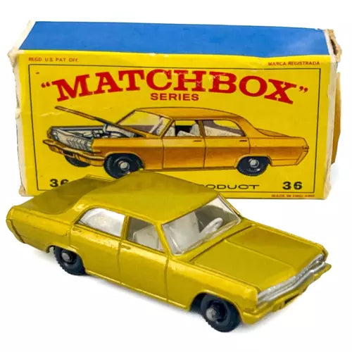 Yellow vintage diecast toy car with display box, Matchbox Series 36 Opel Diplomat