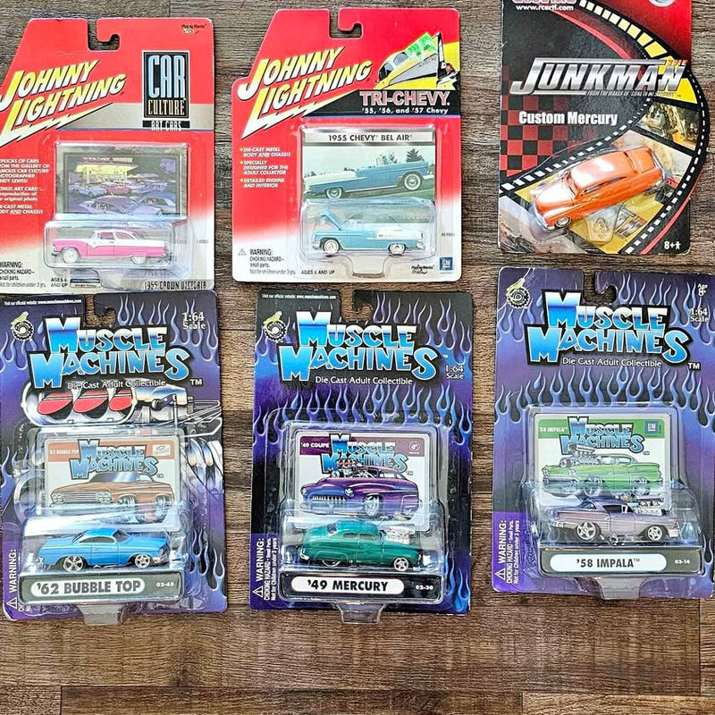 Boxed diecast toy car set with colorful car illustrations and blister packaging