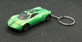 Green diecast car keyring with metal ring and detailed sports car body