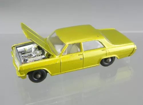 Vintage 1/64 diecast car with open hood, yellow-gold Opel Diplomat, die-cast details